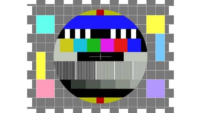 《以前每逢周二，电视机里总有一张充满颜色的圆形是什么？》封面图片